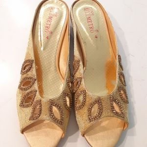 Gold open toed sandals